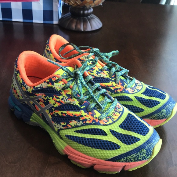 multi colored running shoes